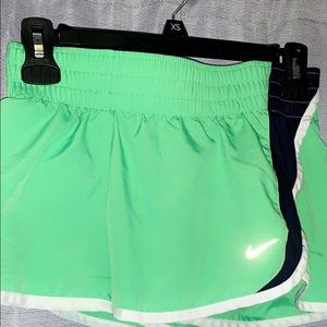 v lined shorter nike shorts